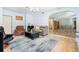 Comfortable living room featuring tile floors and seamless flow into the dining area at 1702 Palmetto Ave, Deland, FL 32724
