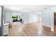 Open living space boasting an open layout, a comfortable living room, and gorgeous flooring at 1702 Palmetto Ave, Deland, FL 32724