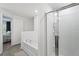 Bright bathroom featuring a shower and soaking tub at 1846 N Acadian Dr, Deltona, FL 32725