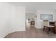 The entryway leads to an open concept living space and eat in kitchen, with neutral decor at 1846 N Acadian Dr, Deltona, FL 32725