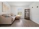 Cozy living room featuring a comfortable sectional sofa and a wooden bookshelf at 1846 N Acadian Dr, Deltona, FL 32725
