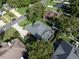 Aerial of residence featuring screened pool, lovely backyard, and convenient boat parking on the side at 19232 Park Place Blvd, Eustis, FL 32736