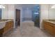 Bright bathroom featuring a large soaking tub, glass shower, and double vanity at 19232 Park Place Blvd, Eustis, FL 32736