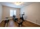 Adaptable bedroom with fitness equipment, window, and ceiling fan at 19232 Park Place Blvd, Eustis, FL 32736