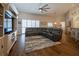 Spacious living room with vaulted ceilings, wood floors, and lots of natural light at 19232 Park Place Blvd, Eustis, FL 32736