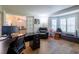 Spacious home office with hardwood floors, a bay window, and a large work area at 19232 Park Place Blvd, Eustis, FL 32736