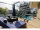 Relaxing outdoor pool area with lounge chairs and spa, enclosed for privacy and enjoyment at 19232 Park Place Blvd, Eustis, FL 32736