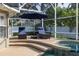 Inviting poolside lounge area with comfortable seating and shade at 19232 Park Place Blvd, Eustis, FL 32736