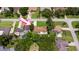 An aerial view of a neighborhood showcasing well-maintained lawns and mature trees offering privacy at 204 Rio Pinar Dr, Ormond Beach, FL 32174