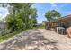 Large backyard with a paved patio area, ideal for grilling and outdoor enjoyment at 204 Rio Pinar Dr, Ormond Beach, FL 32174