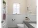 Well-lit bathroom with modern fixtures and a charming aesthetic at 204 Rio Pinar Dr, Ormond Beach, FL 32174