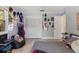 Bedroom with a closet, ample space, light wood floors, and a full bed covered with assorted pillows at 204 Rio Pinar Dr, Ormond Beach, FL 32174