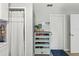 Functional entryway featuring a shoe rack, storage, and easy access to various rooms in the home at 204 Rio Pinar Dr, Ormond Beach, FL 32174