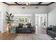 Open living space with stylish decor, wood floors, and natural light at 204 Rio Pinar Dr, Ormond Beach, FL 32174
