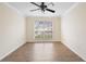 Bonus room featuring wood floors, large windows and a ceiling fan at 2263 Catbriar Way, Oviedo, FL 32765