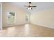 Large bonus room featuring tile flooring and large windows that provide natural light at 2263 Catbriar Way, Oviedo, FL 32765