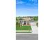 Charming single-story home with a lush green lawn and a long driveway leading to the two-car garage at 2263 Catbriar Way, Oviedo, FL 32765