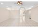 Spacious living area with high ceilings and tiled flooring, offering a bright and airy atmosphere at 2263 Catbriar Way, Oviedo, FL 32765