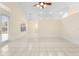 Bright open living room featuring recessed lighting, tile floors, and lots of natural light at 2263 Catbriar Way, Oviedo, FL 32765