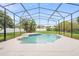 Enclosed pool area, showcasing the beautiful backyard and refreshing water, perfect for relaxation at 2263 Catbriar Way, Oviedo, FL 32765