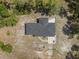 Birds-eye view of property with a home, fenced in yard, and mature trees at 2620 Doyle Rd, Deltona, FL 32738
