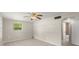 Neutral bedroom featuring a ceiling fan and closet at 2633 Yale Rd, South Daytona, FL 32119
