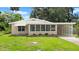 Charming single-story home featuring a well-maintained lawn and neutral exterior color at 2633 Yale Rd, South Daytona, FL 32119