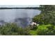 Stunning lakefront property with a private dock, offering serene water views and recreational opportunities at 270 Sandyhook Ln, Deland, FL 32724