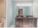 Bathroom featuring a dual sink vanity with a dark wood finish and plenty of counter space at 2724 N Halifax Ave, Daytona Beach, FL 32118