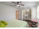 Bedroom features hardwood floors and closet with stylish floral wallpaper at 2724 N Halifax Ave, Daytona Beach, FL 32118