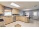 Beautiful kitchen with light cabinets, stainless steel appliances, and granite countertops at 2724 N Halifax Ave, Daytona Beach, FL 32118