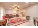 Open living room area includes tiled floors, a ceiling fan, and direct access to the dining room at 2724 N Halifax Ave, Daytona Beach, FL 32118
