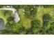 Private estate featuring a home, outbuildings, and lush landscaping at 2950 Ragis Rd, Edgewater, FL 32132