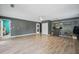 Large finished basement with a utility area and new flooring at 2950 Ragis Rd, Edgewater, FL 32132