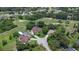 Beautiful home nestled among trees with a screened pool, surrounded by a well-manicured golf course at 3 Pine Meadow Ct, Debary, FL 32713