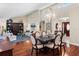Bright living room featuring hardwood floors, high ceilings, and stylish furniture at 3 Pine Meadow Ct, Debary, FL 32713
