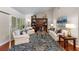 Comfortable living room featuring stylish furniture, hardwood floors, and natural light at 3 Pine Meadow Ct, Debary, FL 32713