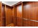 Empty walk-in closet offers custom shelving and hanging space for organized storage at 3 Pine Meadow Ct, Debary, FL 32713