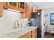 Modern kitchen featuring ample counter space, stainless steel appliances, and stylish cabinetry at 3003 S Atlantic Ave # 3A2, Daytona Beach Shores, FL 32118