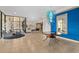 Welcoming lobby area with a striking chandelier, modern decor, and comfortable seating, exuding elegance at 3003 S Atlantic Ave # 3A2, Daytona Beach Shores, FL 32118