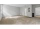 Spacious carpeted bedroom with gray walls, decorative accents, and ample natural light at 31 Abacus Ave, Ormond Beach, FL 32174