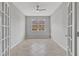 Bright bedroom with large windows, neutral walls, and tile floor at 31 Abacus Ave, Ormond Beach, FL 32174