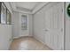 Welcoming foyer with tile flooring, neutral walls, and elegant decorative touches at 31 Abacus Ave, Ormond Beach, FL 32174
