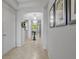 Spacious foyer featuring tile flooring, recessed lighting, and an open view of the living area at 31 Abacus Ave, Ormond Beach, FL 32174