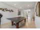 Spacious game room featuring a ping pong table, recessed lights and neutral colored walls at 31 Abacus Ave, Ormond Beach, FL 32174