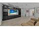 Comfortable living room with custom built-ins, decorative lighting, and tile flooring at 31 Abacus Ave, Ormond Beach, FL 32174