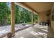 A covered patio with brick pavers and an outdoor fire pit provides a great place for entertaining at 31 Abacus Ave, Ormond Beach, FL 32174