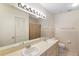 The bathroom is equipped with dual sinks, tile floors and shower at 325 Homewood Ave # 10I, Debary, FL 32713