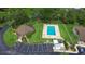 Aerial view of the community pool and clubhouse, showcasing the surrounding landscape and parking at 325 Homewood Ave # 10I, Debary, FL 32713