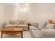 Bright living room featuring tile flooring, comfortable sofas, and an open concept design at 325 Homewood Ave # 10I, Debary, FL 32713